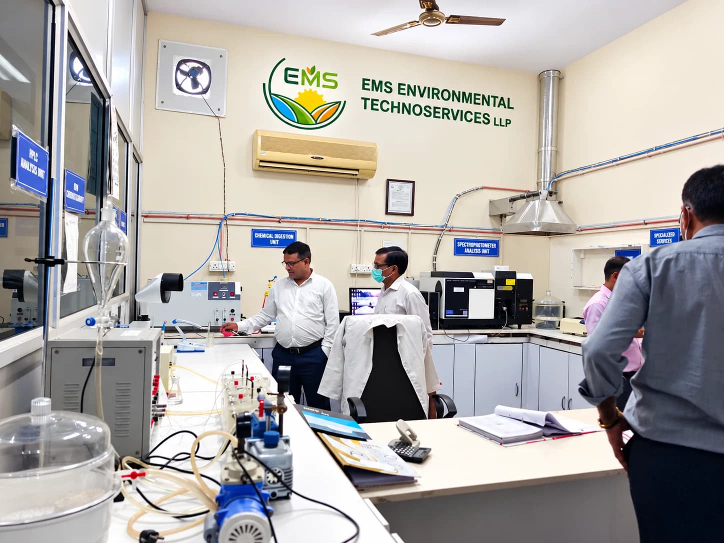 EMS laboratory team working among testing equipment